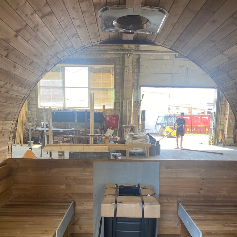 Interior view of the Stellar 6-person barrel sauna