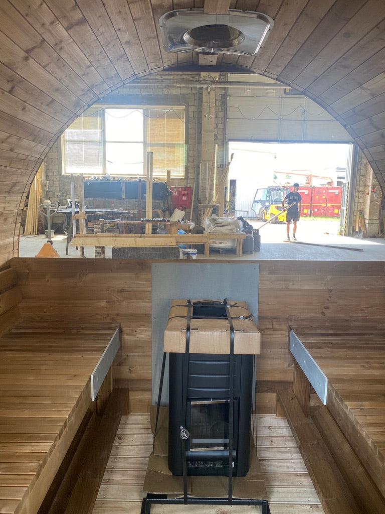 Interior view of the Stellar 6-person barrel sauna