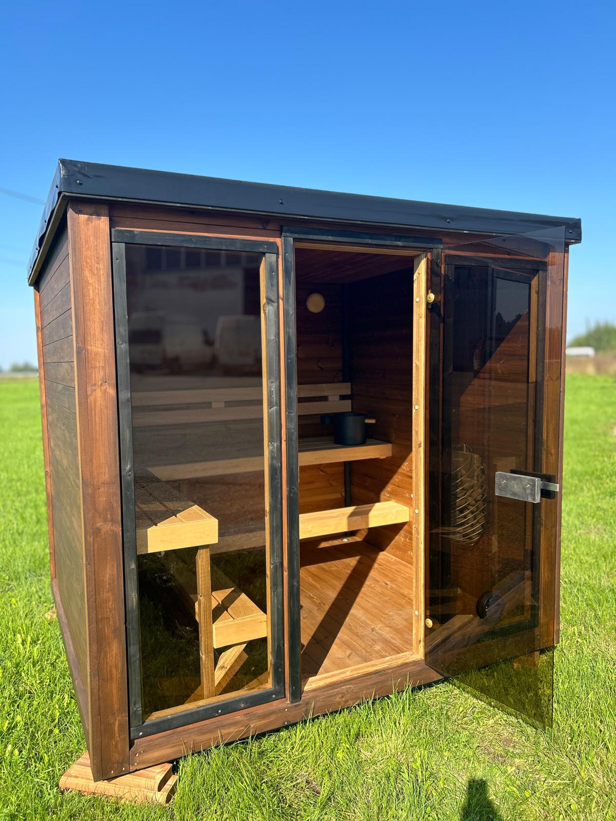 Monarch King Traditional Outdoor Sauna on a field front view