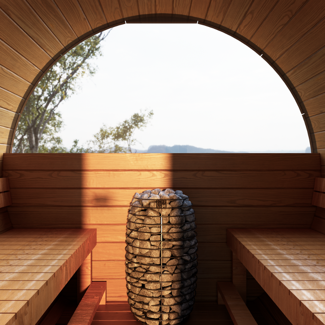 Cozy Stellar 6-person barrel sauna interior with smooth wooden benches