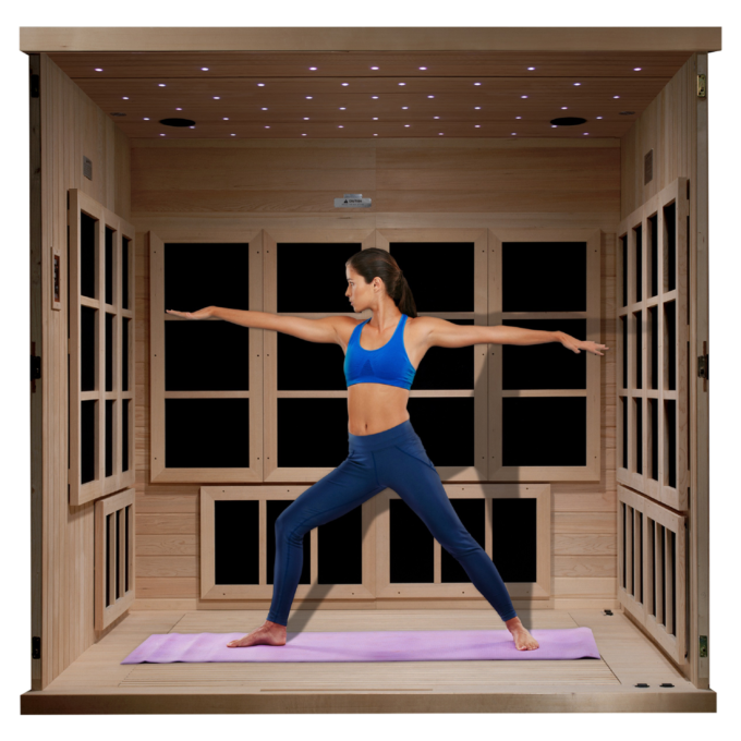 Full wood Interior of Majestic Sauna with a person doing yoga