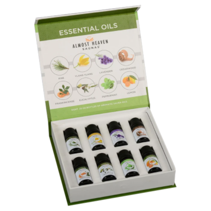 A box of Sauna essential oils with labeled bottles inside, arranged neatly in a presentation box.