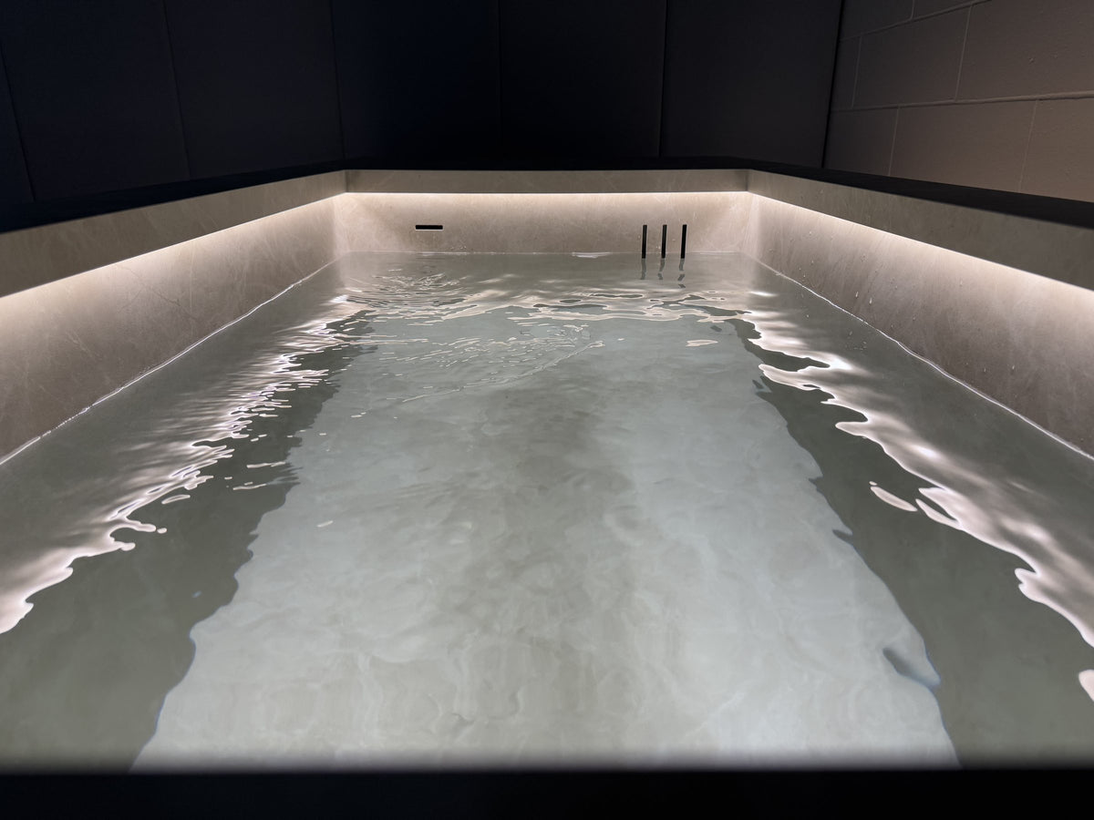Walk-in plunge pool with perimeter lighting