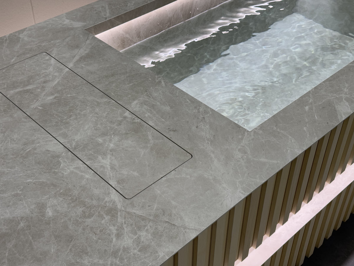 Cold plunge with stone deck, up close