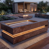 Loki Porfido Marrone cold plunge lit at dusk on a landscaped patio